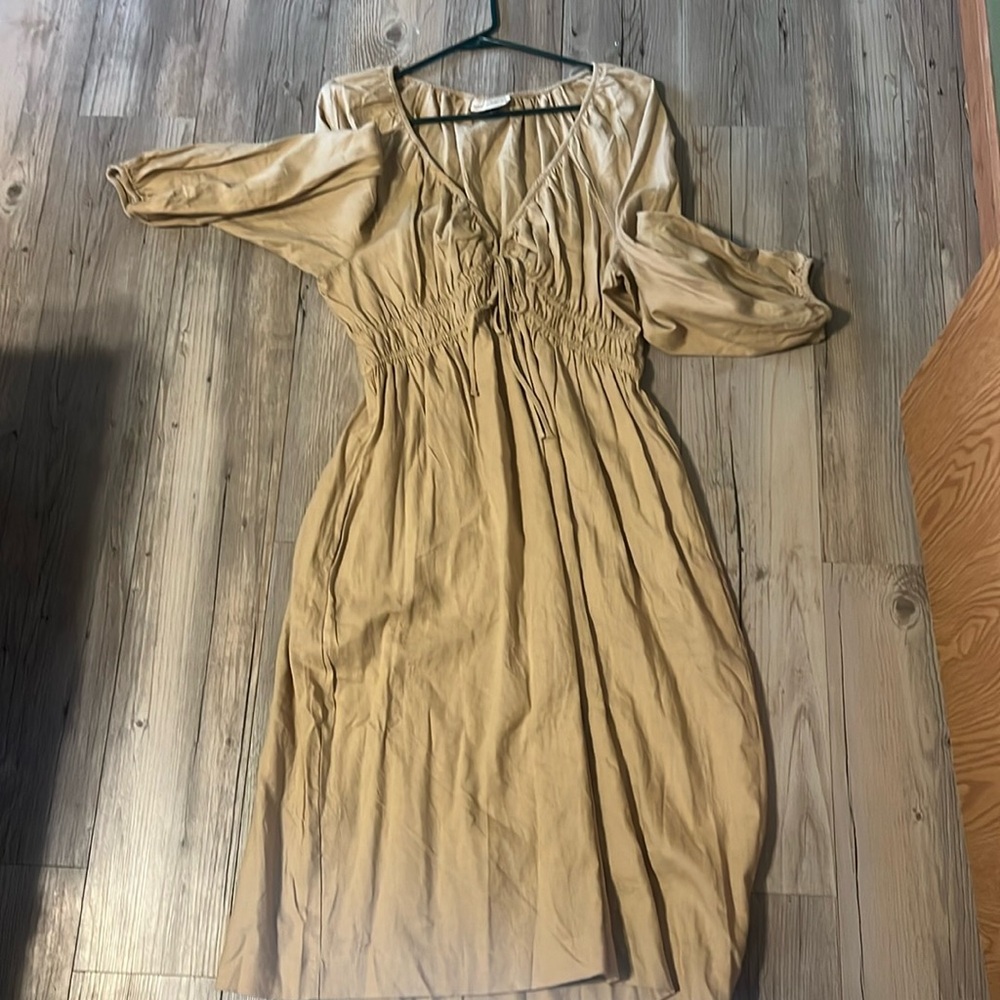 Brand new without tags, never worn. Universal thread dress size M
